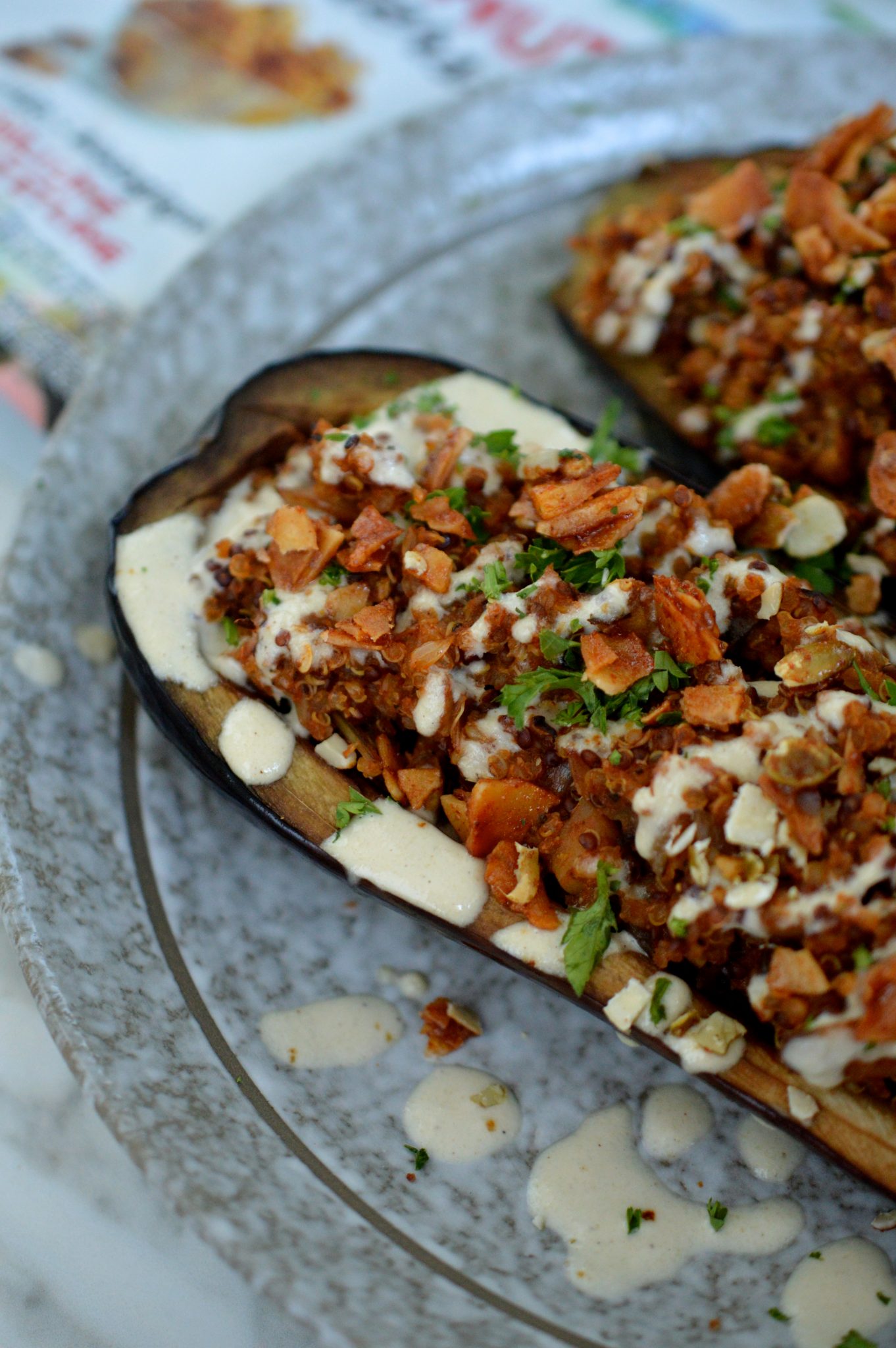 Quinoa Stuffed Eggplant with coconut clusters